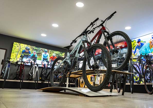 Inside The Bike Cellar workshop, with the bike fit and service bench visible at the back of the Plymstock unit.